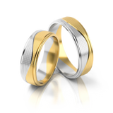 Roumee Trauringe in Gelbgold & Weißgold