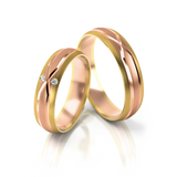 Roumee Trauringe in Gelbgold & Rotgold