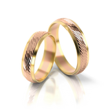 Roumee Trauringe in Gelbgold & Rotgold